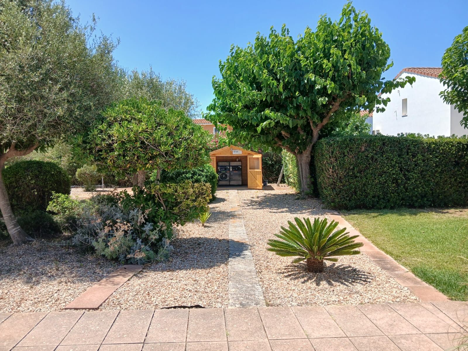 Autoservicio de lavadora y secadora · Apartamentos Sa Caleta · Ciutadella · Menorca